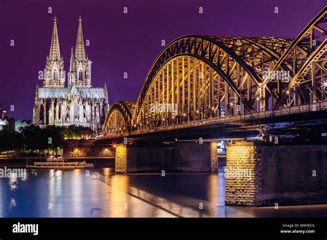 Cologne, Germany. Night View Of Cologne Cathedral And Hohenzollern ...