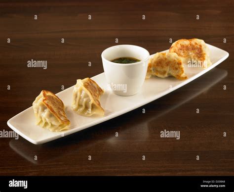 Pan Fried Dumplings Stock Photo Alamy