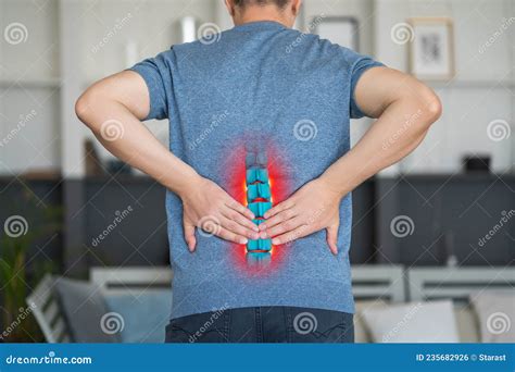 Lumbar Intervertebral Spine Hernia Man With Back Pain At Home Spinal