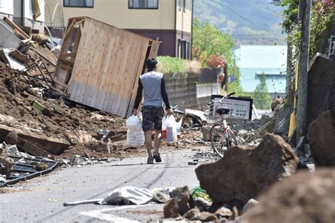 Crews Rush To Save Trapped Residents After Japan Quakes Death Toll