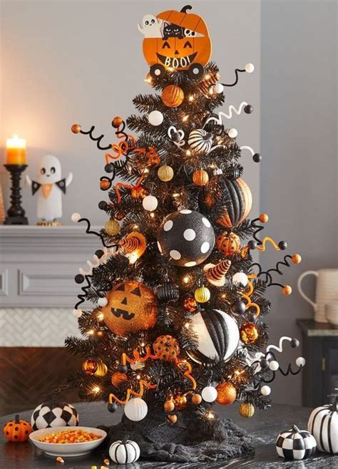 15 a black Halloween tree with white, gold, orange and black and white ...