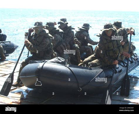 Us Navy Members Of The 31st Marine Expeditionary Unit Meu Wait Ready On The Stern Gate Of