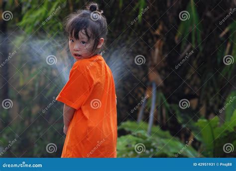 A Girl Splash Water in the Garden Stock Image - Image of action, lawn ...