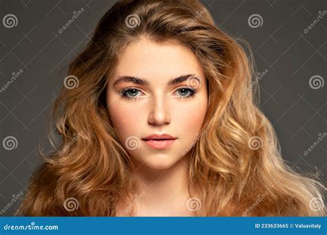 Closeup Portrait Of An Young Adult Girl With Long Curly Hair Photo Of