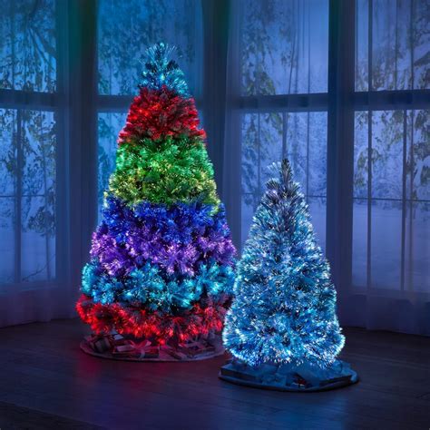 The Flocked Northern Lights Tree Hammacher Schlemmer