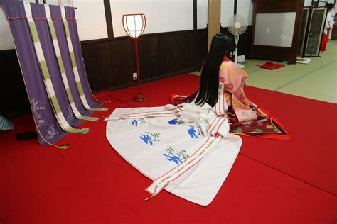 A Woman Dressed In Junihitoe At A Kimono Photography Experience