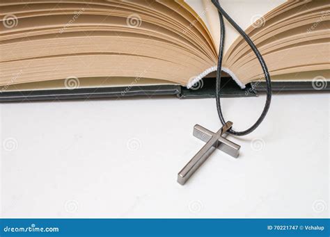 Metallic Crucifix And Opened Holy Bible Stock Image Image Of Necklace