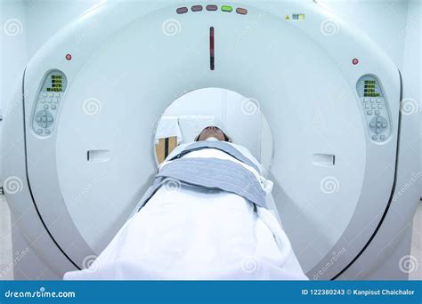 Patients Screening On Ct Scanner Man Undergoing Ct Scan While Doctor`s