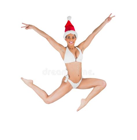 Fit Girl In Bikini Smiling At Camera Wearing Santa Hat Stock Image