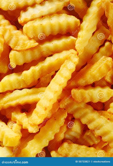 Close Up Crinkle Cut Golden Fried Potato Fries Stock Photo Image