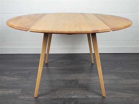 Ercol Round Drop Leaf Dining Table 1970s 221727