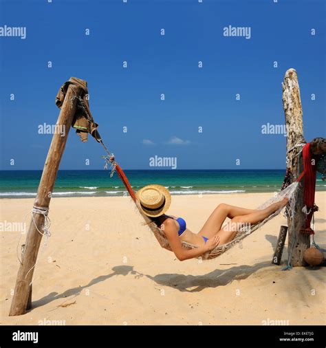 Woman In Hammock On Beach Stock Photo Alamy