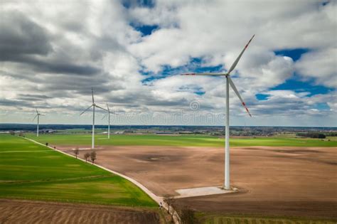 Aerial View Of Ecological Wind Turbines As Alternative Energy Stock