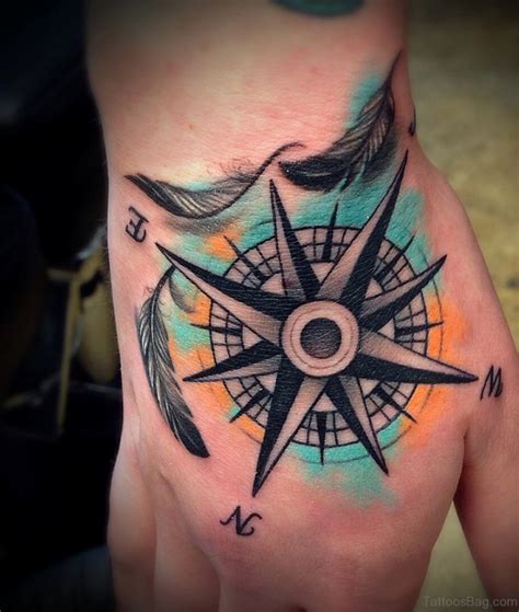 45 Great Compass Tattoos On Hand Tattoo Designs