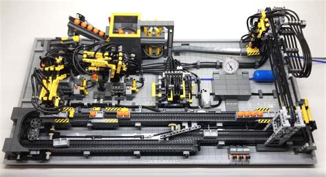 Three LEGO motors, 17 LEGO pneumatic cylinders and a pinch of ...