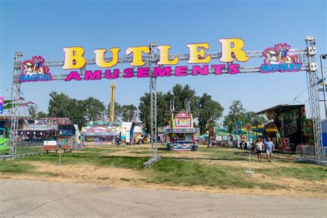 Sign for Bulter Amusements at the Midway Amusement Park Rides at the ...