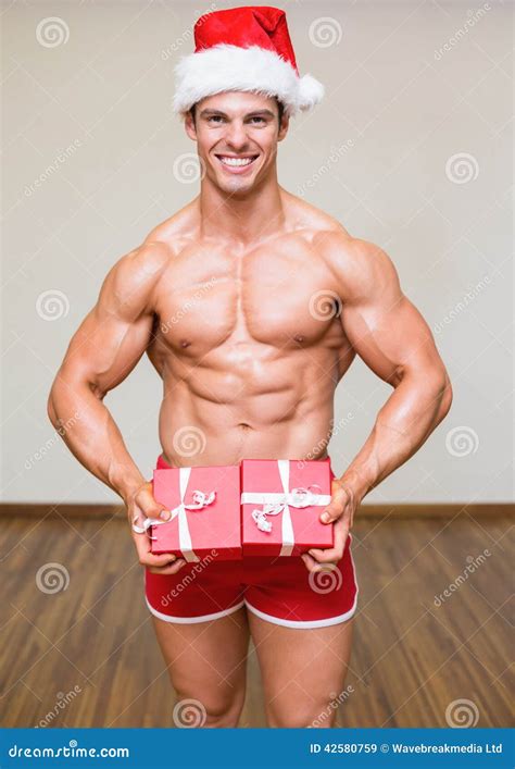 Shirtless Macho Man In Santa Hat Holding Gifts Stock Image Image Of