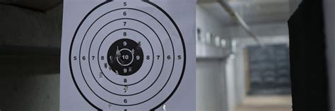 Premium Photo | Closeup of round target with marked bullseye for ...