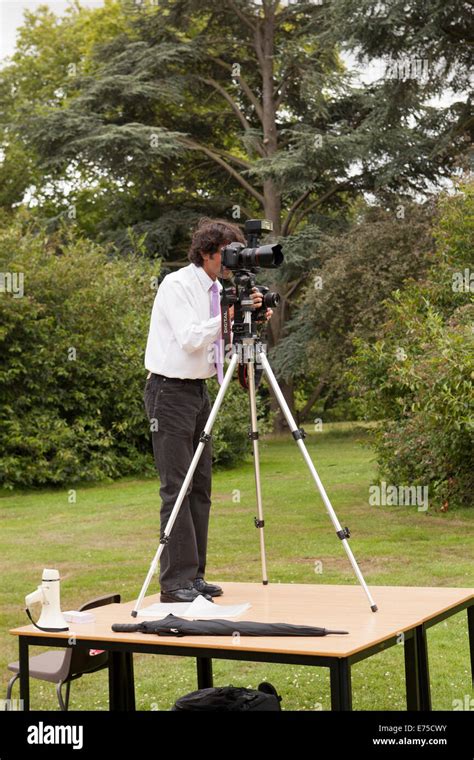 photographer and tripod Stock Photo - Alamy