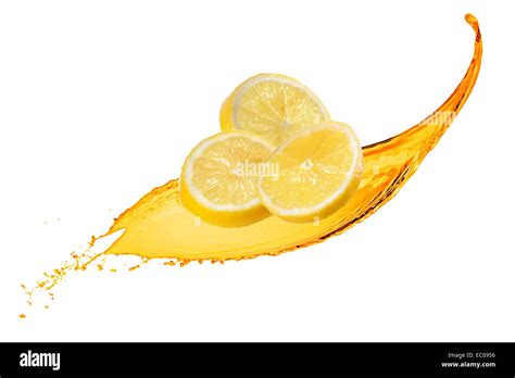 Falling Slices Of Lemon With Juice Splash Isolated On White Stock Photo