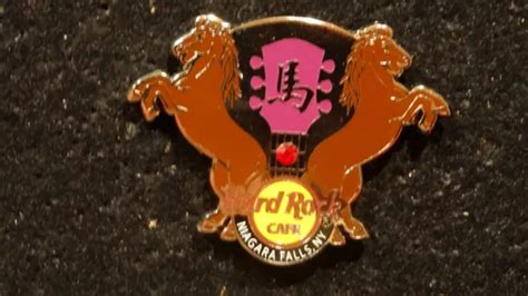 PIN S ARGENTÉ HARD rock café cheval horse dble pics guitare Niagara