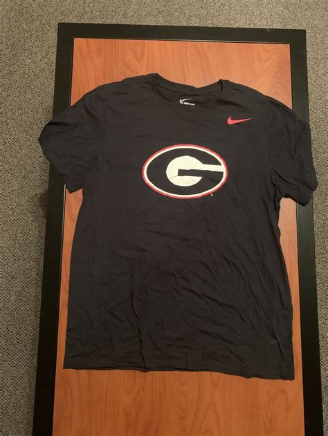 Nike UGA black t-shirt M | Black tshirt, Athletic jacket, Nike jacket