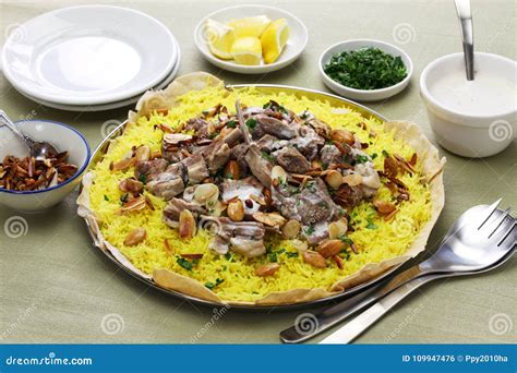 Mansaf, Jordanian National Dish Stock Photo - Image of almonds, meal ...