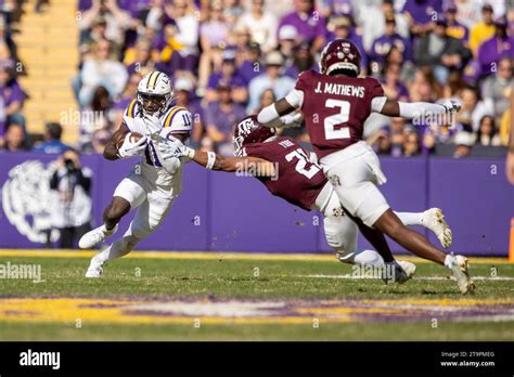 LSU Tigers wide receiver Brian Thomas Jr. (11) runs after the catch as ...