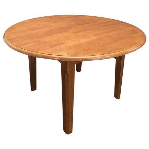 Cherry Wood Round Dining Table - AptDeco