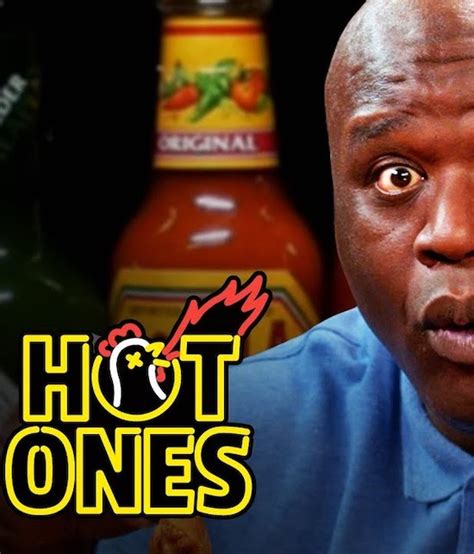 Shaq Tries To Not Make A Face While Eating Spicy Wings ⋆ Terez Owens