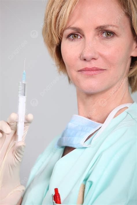 Nurse Preparing An Injection Photo Background And Picture For Free