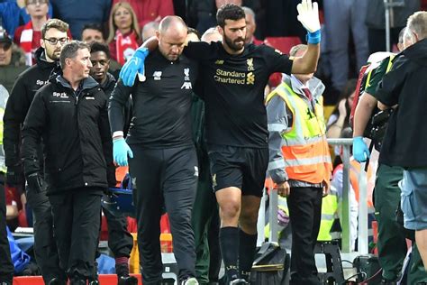 Alisson Becker limps off for Liverpool with painful looking injury to leave Jurgen Klopp with ...