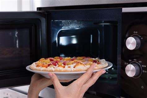 How To Reheat Pizza In Microwave Oven Storables