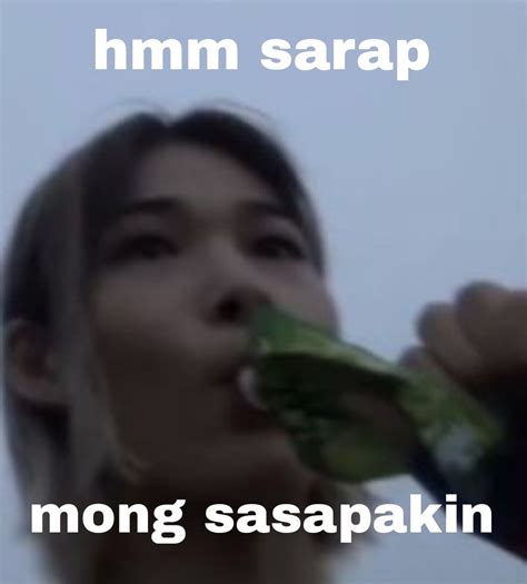 A Woman Drinking From A Green Bottle With The Words Mmmm Sarap On It