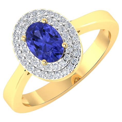 M Christoff Tanzanite Ring W Pavé Diamond Halo And Shoulders At