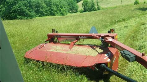 Ih 1086 And Caseih Dc102 Discbine Mowing Hay Youtube