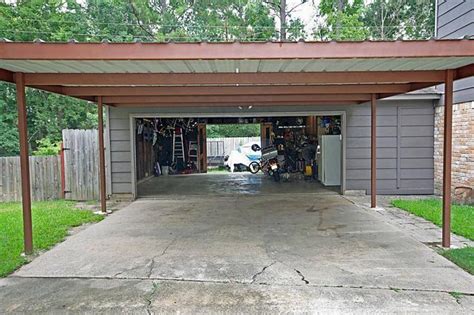 Garage with Attached Carport and Two Motorcycles