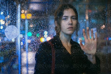 Portrait Of A Waiting Girl Through A Glass By Stocksy Contributor Demetr White Stocksy