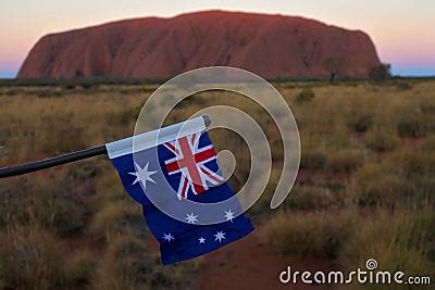 Flag Of Australia Against Uluru Ayers Rock At Sunset Uluru Kata Tjuta