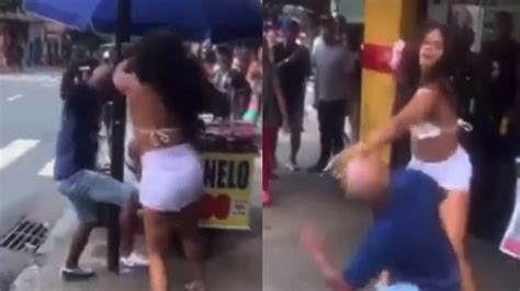 VÍDEO Idoso e mulher trocam socos e chutes no meio da rua