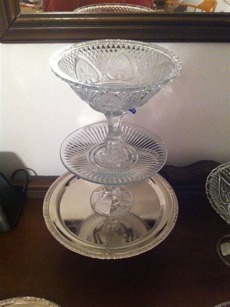 Dollar store glass plates, bowls, candlesticks and silver platters. $6 ...