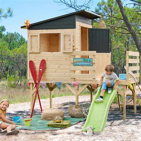 Cabane En Bois Lasur Sur Pilotis Avec Toit Plat Et Toboggan Pour