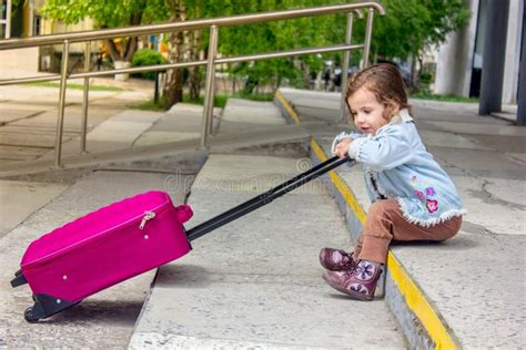 Little Girl Travel Alone. Now she on the Railway Station. Stock Photo ...