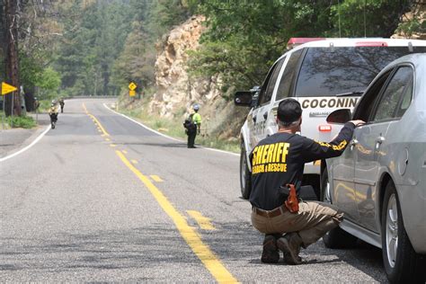 Img1808 A Coconino County Sheriffs Official Watches As F Flickr