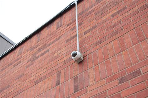 Round Security Cctv Camera Mounted To Brick Wall P Stock Photo Image