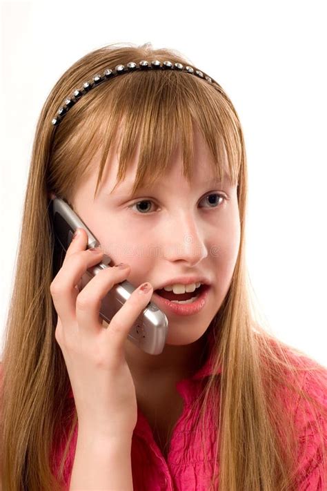 Menina Do Adolescente Que Fala Pelo Telefone Móvel Isolado Sobre Foto