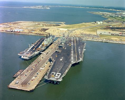 An Aerial View Of Hms Ark Royal R09 Next To Uss Nimitz Cvn 68 At