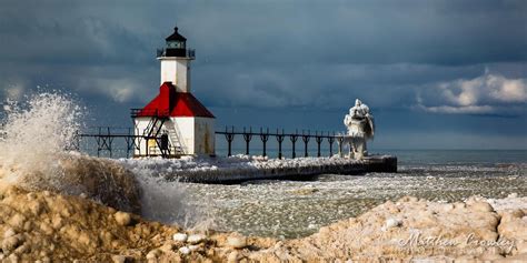 St Joseph Pier Lighthouse In Winter With Dark Clouds In The