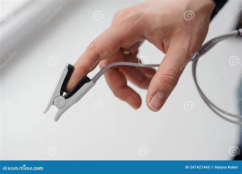 Pulse Oximeter On A White Background Medical Monitoring And Diagnostic