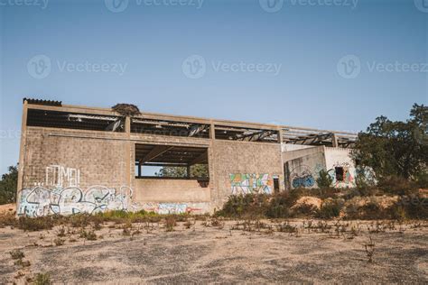 Abandoned warehouse with graffitis 21829810 Stock Photo at Vecteezy